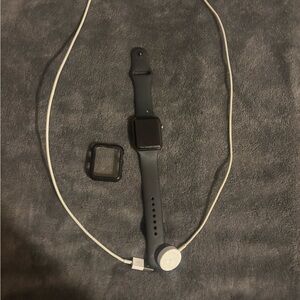 Apple Smartwatch with Black Band and Charger